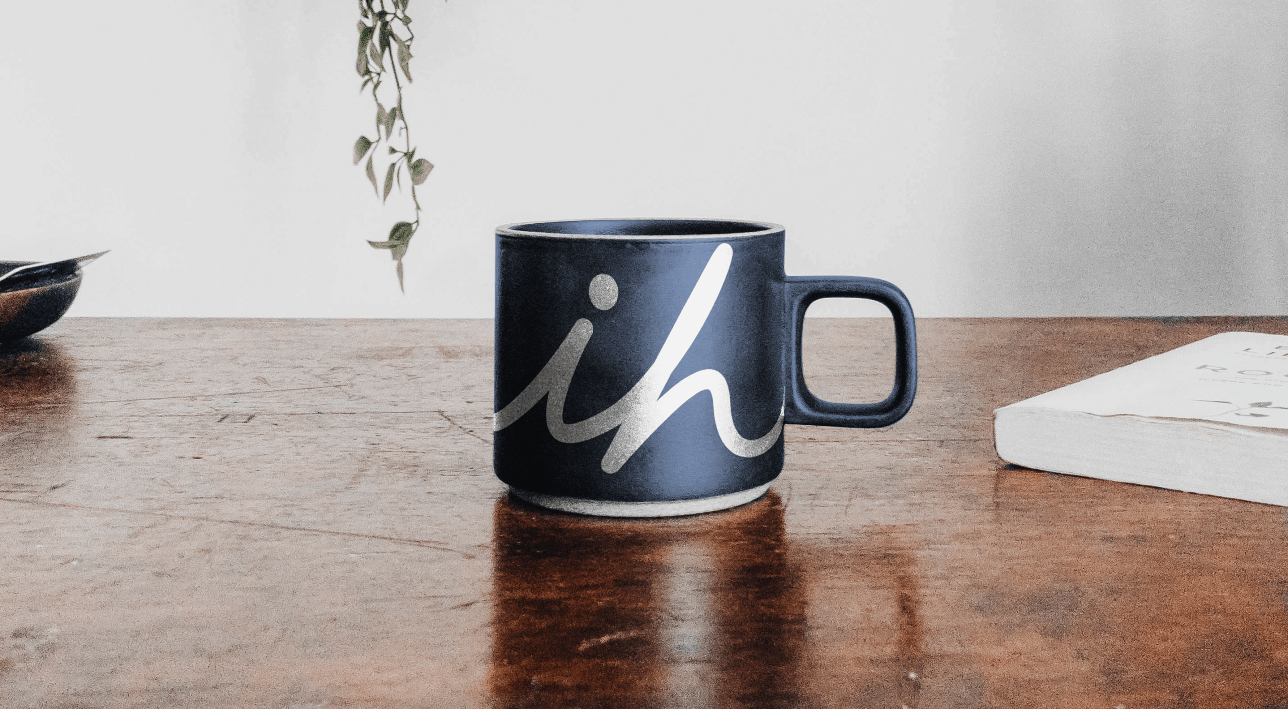 Mug on Table Mockup min scaled