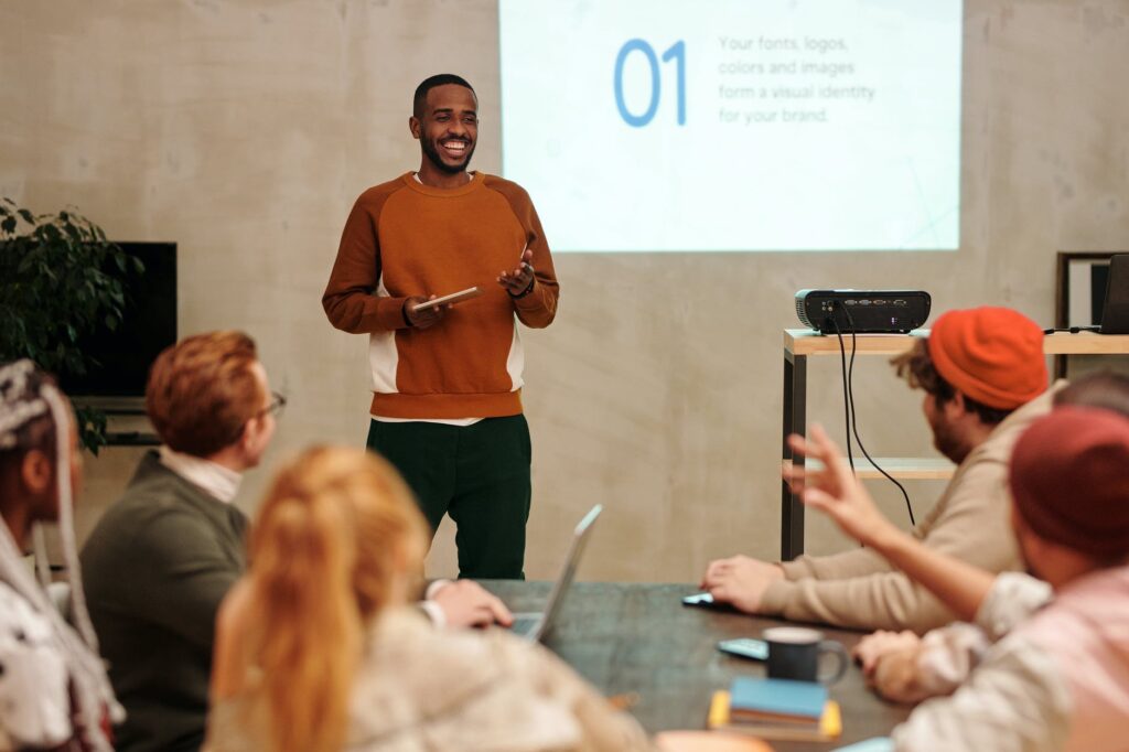 business leader presenting to team, pr agency