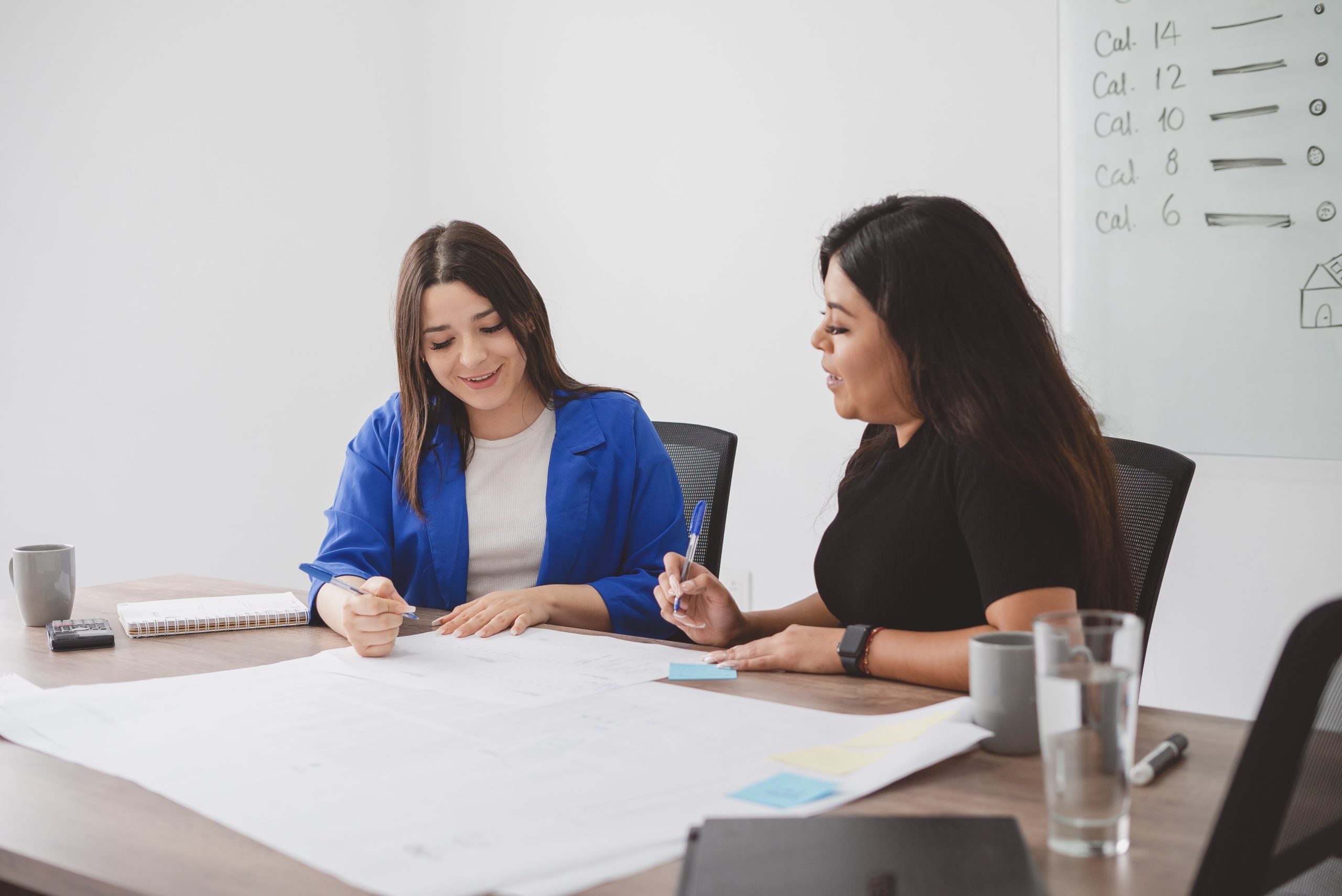 coworkers working together in office return to work
