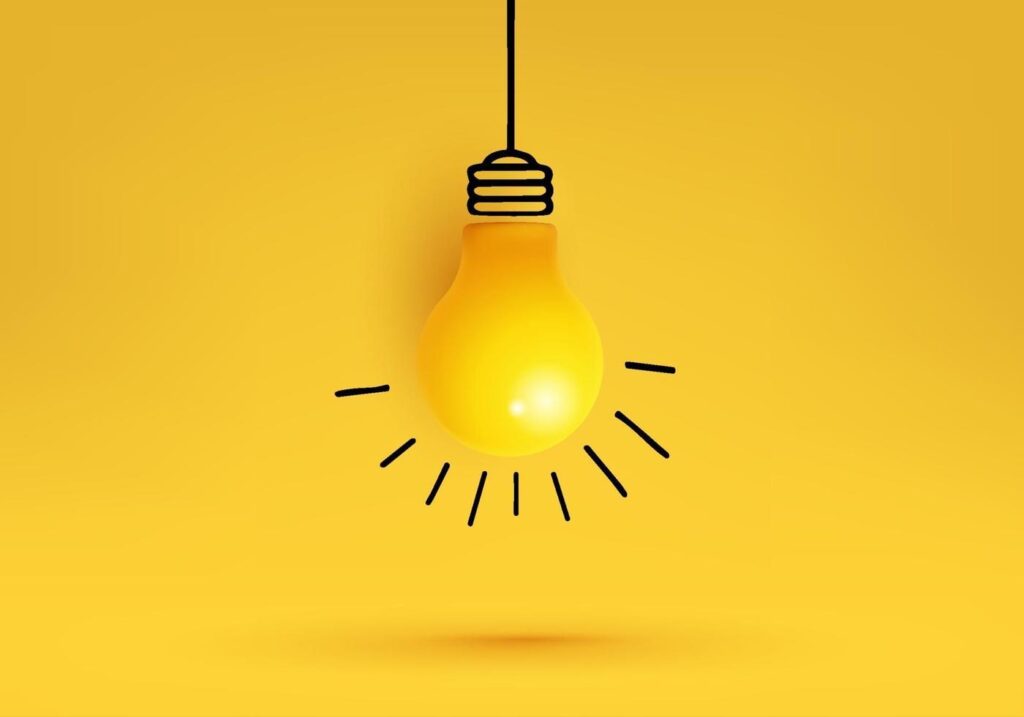 creative idea inspiration new idea and innovation concept with light bulb on yellow background vector 1